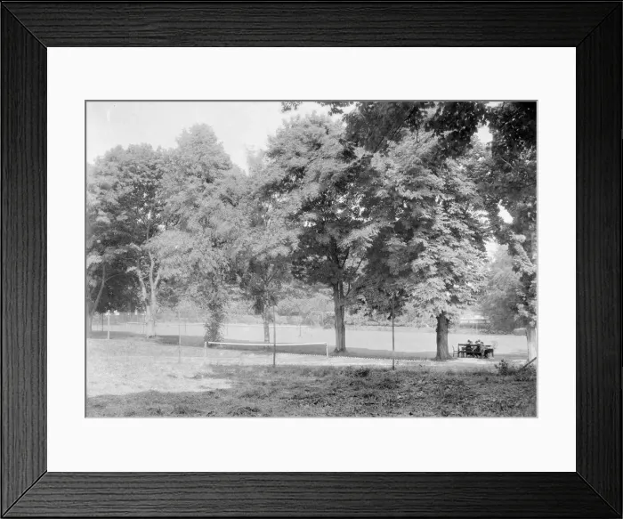 Framed Print : Grass tennis court among trees, c1935. Creator: Kirk & Sons of Cowes Framed Print : Grass tennis court among trees, c1935. Creator: Kirk & Sons of Cowes