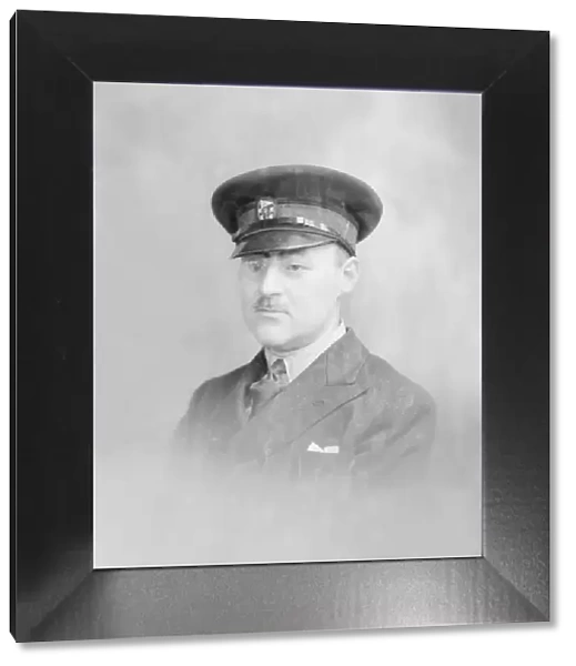 Portrait of a man in uniform, c1935. Creator: Kirk & Sons of Cowes