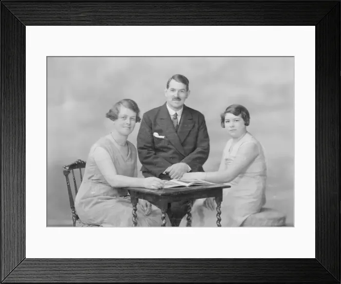 Framed Print : Portrait of two women and a man, c1935. Creator: Kirk & Sons of Cowes Framed Print : Portrait of two women and a man, c1935. Creator: Kirk & Sons of Cowes