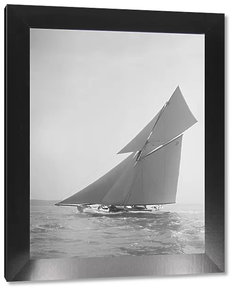 The cutter Rosamond sailing close-hauled, 1911. Creator: Kirk & Sons of Cowes