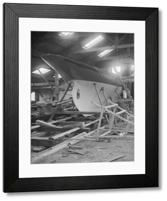 Framed Print : The yawl Banzai in shed at boatyard, 1912. Creator: Kirk & Sons of Cowes Framed Print : The yawl Banzai in shed at boatyard, 1912. Creator: Kirk & Sons of Cowes