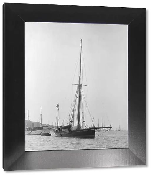 The 40 ton yawl Hyacinth at anchor, 1913. Creator: Kirk & Sons of Cowes