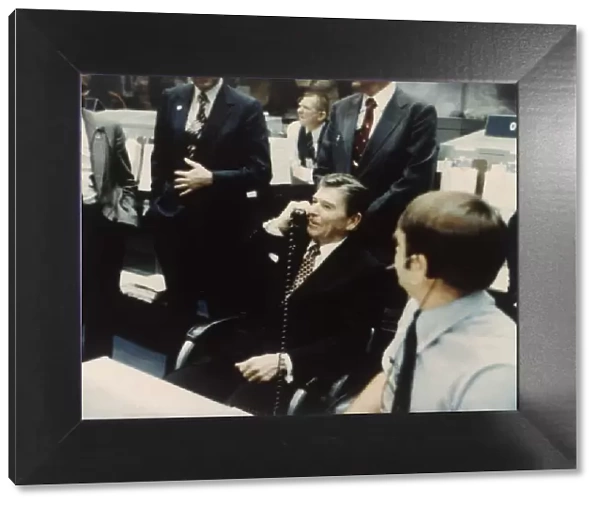 President Ronald Reagan speaks to astronauts on the Space Shuttle, 1981. Creator: NASA