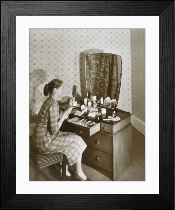 Framed Print : Woman at her dressing table, c1955. Creator: English Photographer (20th Century) Framed Print : Woman at her dressing table, c1955. Creator: English Photographer (20th Century)