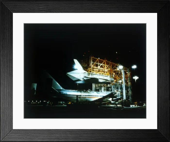 Framed Print : Space Shuttle and 747 carrier plane in Mate-Demate Device. Creator: NASA Framed Print : Space Shuttle and 747 carrier plane in Mate-Demate Device. Creator: NASA