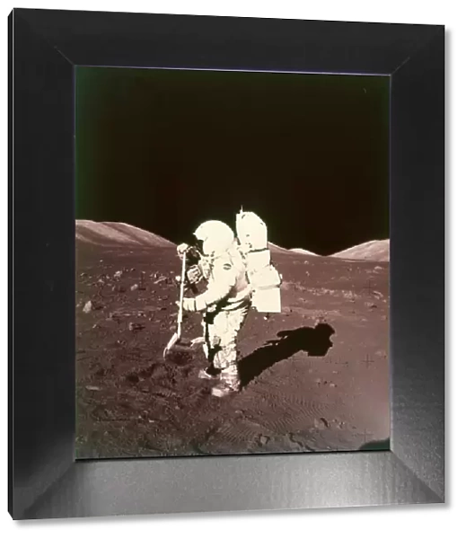 Harrison Schmitt collects lunar rake samples, Apollo 17 mission, December 1972. Creator: NASA