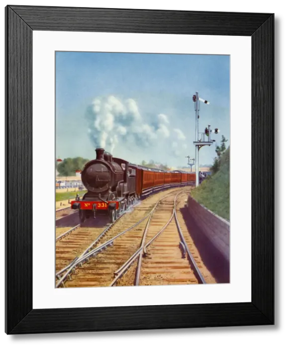 Framed Print : Leaving Dublin. Great Southern Railways train, hauled by a 4-4-0 passenger express, 1935 Framed Print : Leaving Dublin. Great Southern Railways train, hauled by a 4-4-0 passenger express, 1935