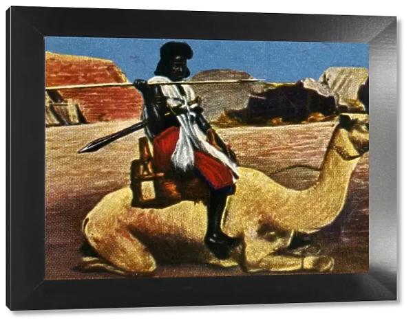 Sudanese warrior riding a camel, c1928. Creator: Unknown