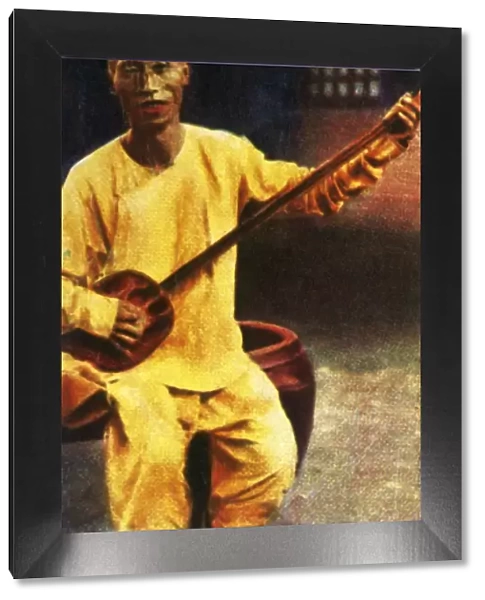 Teahouse musician, China, c1928. Creator: Unknown