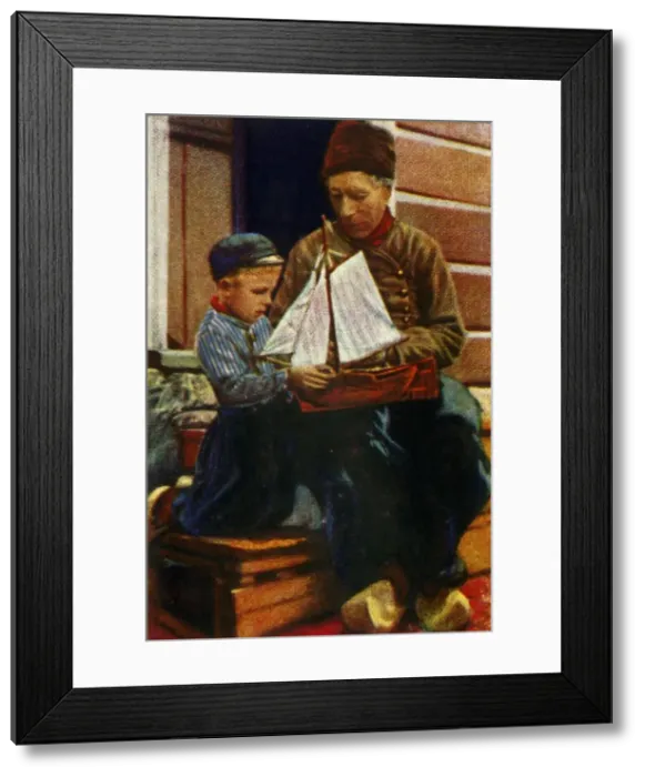 Framed Print : Dutch father and son in traditional dress, c1928. Creator: Unknown Framed Print : Dutch father and son in traditional dress, c1928. Creator: Unknown