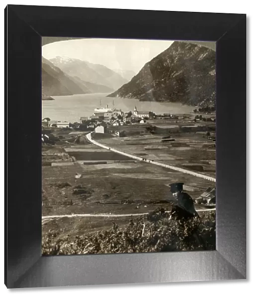 Village roofs and sunny fields of Odde, N. up the narrow mountain-walled Sorfjord, Norway, 1905