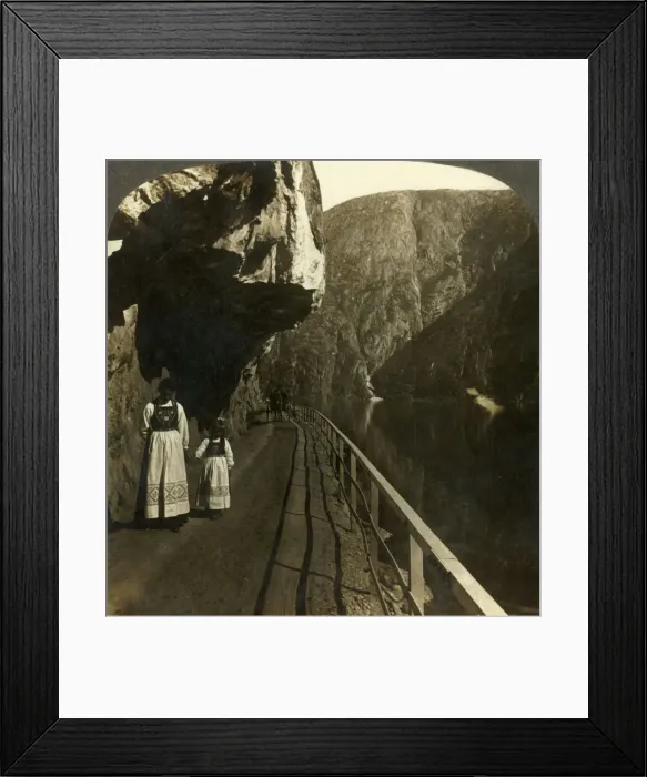 Framed Print : Narrow rock-shelf where the road to Voring Falls past Lake Oifjords deep waters Framed Print : Narrow rock-shelf where the road to Voring Falls past Lake Oifjords deep waters