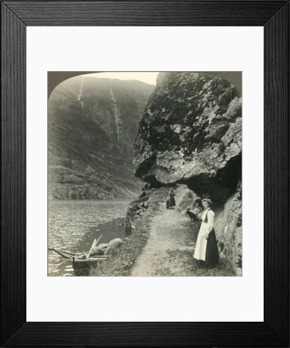 Framed Print : Where the road creeps under the jutting cliffs by the waters of the Nerofjord, Norway, c1905 Framed Print : Where the road creeps under the jutting cliffs by the waters of the Nerofjord, Norway, c1905