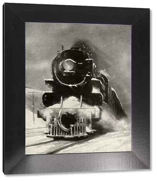 The fury of the blizzard makes no impression on this mammoth locomotiv, 1935