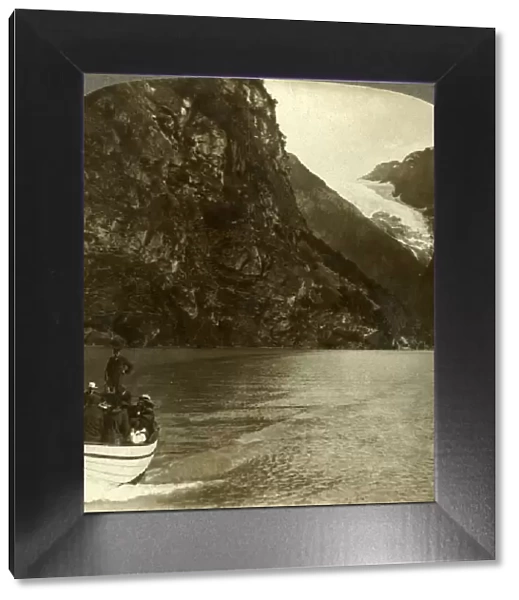 Tourists crossing Lake Loen - view across to a huge glacier, Norway, c1905. Creator: Unknown