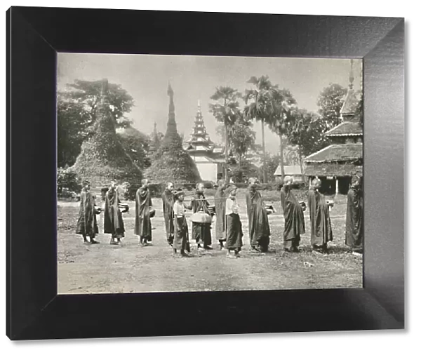 Burmese Phoongyies Collecting Alms, 1900. Creator: Unknown