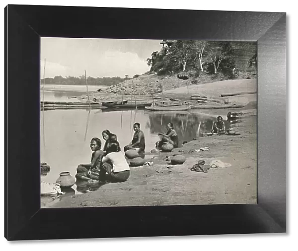 Typical Riverside Scene on the great Irrawaddy - Women bathing and drawing water, 1900