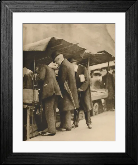 Framed Print : At One of the Bookstalls of the Farringdon Road Market, c1935. Creator: Walter Benington Framed Print : At One of the Bookstalls of the Farringdon Road Market, c1935. Creator: Walter Benington
