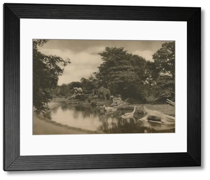 Framed Print : Where the Beasts of Prehistory Lurk By the Lake in the Palace Grounds, c1935. Creator: Unknown Framed Print : Where the Beasts of Prehistory Lurk By the Lake in the Palace Grounds, c1935. Creator: Unknown