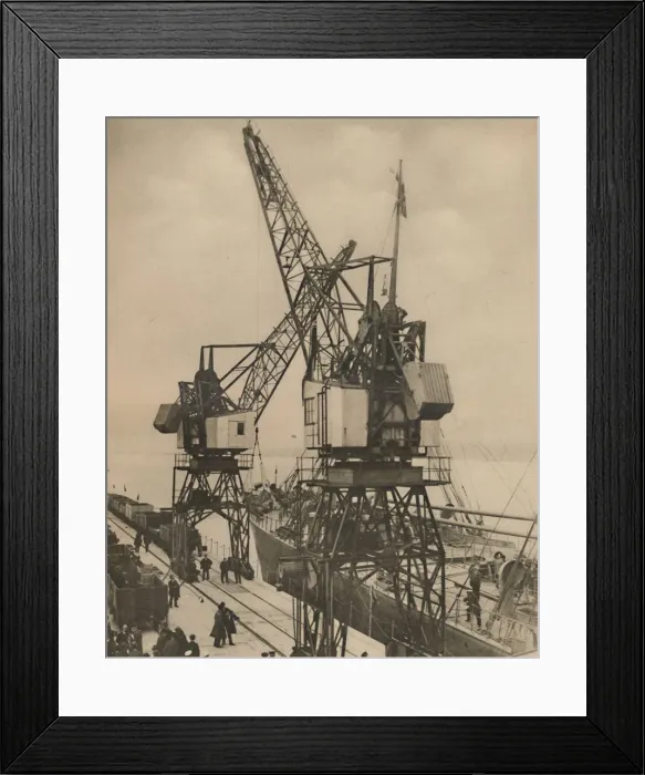 Framed Print : Huge Mobile Cranes at Tilbury Swing the Cargo from a Vessels Hold, c1935. Creator: Unknown Framed Print : Huge Mobile Cranes at Tilbury Swing the Cargo from a Vessels Hold, c1935. Creator: Unknown