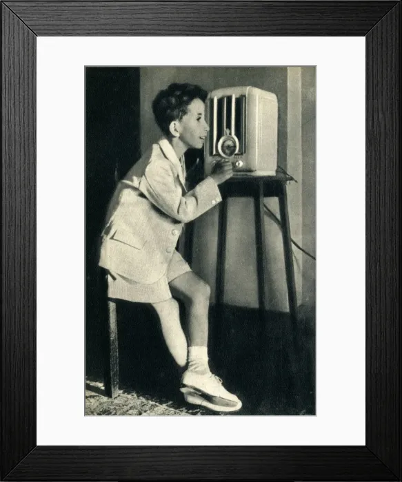 Framed Print : King Faisal of Iraq listening to a broadcast prepared for his birthday by the BBC, 1942 Framed Print : King Faisal of Iraq listening to a broadcast prepared for his birthday by the BBC, 1942