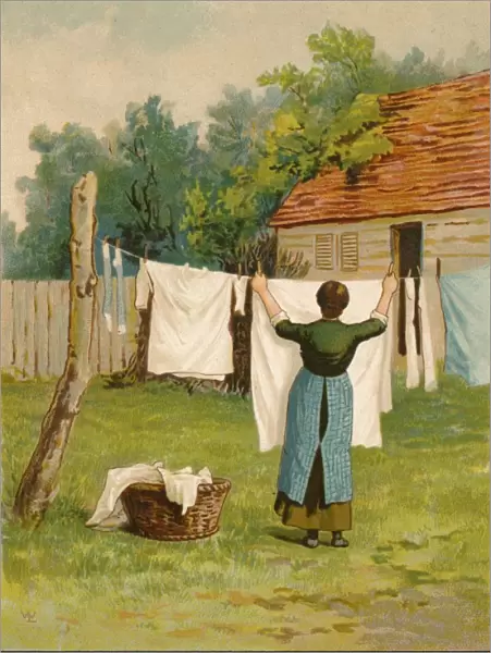 Woman hanging up washing, late 19th-early 20th century? Creator: Unknown