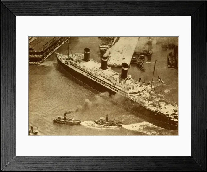 Framed Print : An Aerial Photograph of the Leviathan Being Towed By Small Tugs Into Framed Print : An Aerial Photograph of the Leviathan Being Towed By Small Tugs Into