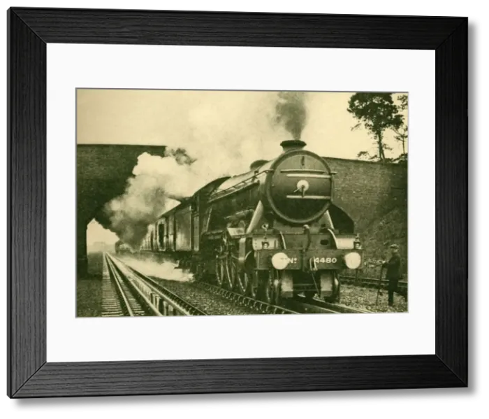 Framed Print : A Pacific Engine Picking Up Water at the Rate of 2, 500 Gallons in Ten Seconds - London Framed Print : A Pacific Engine Picking Up Water at the Rate of 2, 500 Gallons in Ten Seconds - London