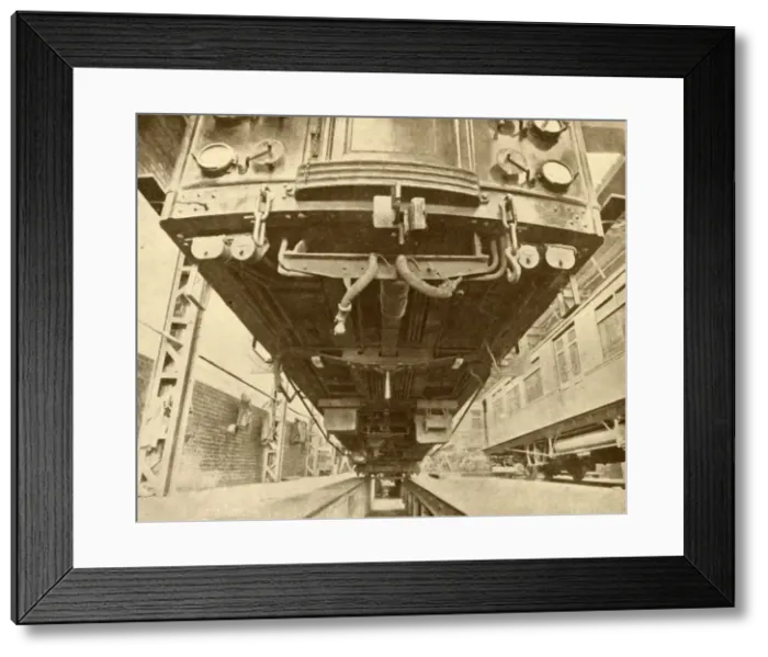 Framed Print : Under the Underground: Beneath a District Railway Electric Car, 1930. Creator: Unknown Framed Print : Under the Underground: Beneath a District Railway Electric Car, 1930. Creator: Unknown