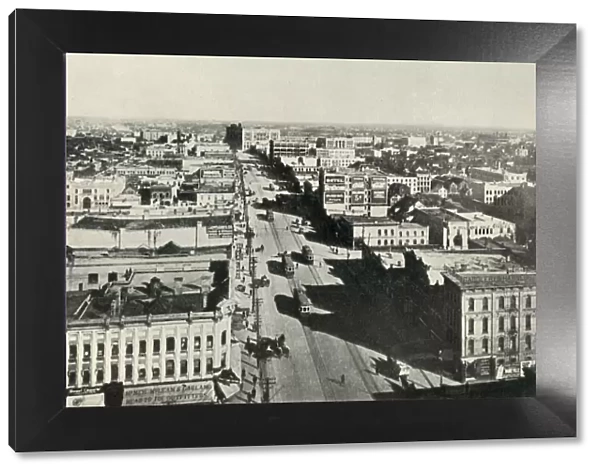 Winnipeg To-Day; Looking Up Main Street. - The Rapid Growth of Modern Canada, c1930