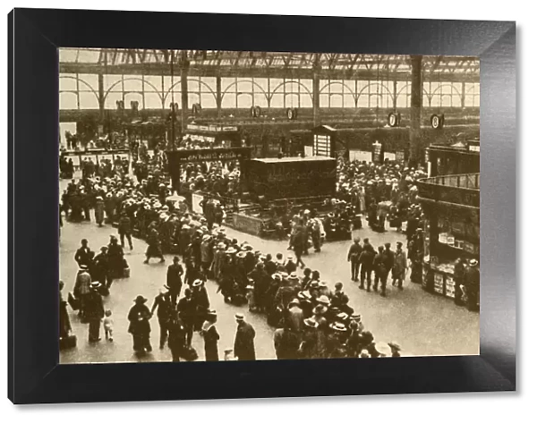 A Queue of Holiday-Makers Waiting for Trains at Waterloo Station, London, 1930