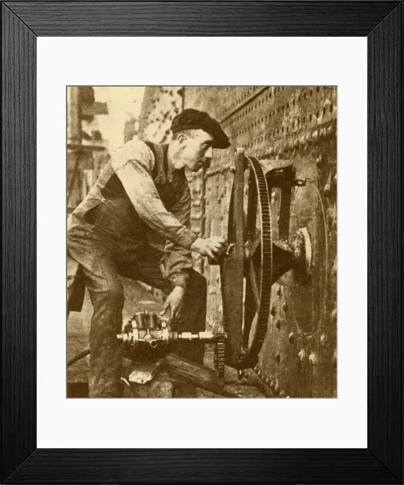 Framed Print : A Pneumatic Riveter Cutting Portholes in the Side of a Liner, c1930 Framed Print : A Pneumatic Riveter Cutting Portholes in the Side of a Liner, c1930