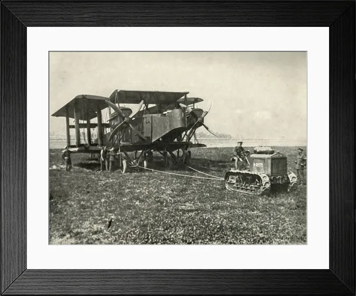 Framed Print : A Small Motor Tractor Getting a Huge R.A.F. Bombing Machine into Position... (1919) Framed Print : A Small Motor Tractor Getting a Huge R.A.F. Bombing Machine into Position... (1919)