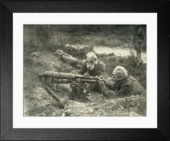 Framed Print : Machine Gunners in Action Wearing their Gas Helmets, (1919). Creator: Unknown Framed Print : Machine Gunners in Action Wearing their Gas Helmets, (1919). Creator: Unknown