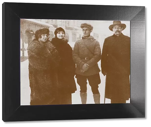 Moura Budberg (second from left) with Maxim Gorky (right), c. 1920. Artist: Anonymous