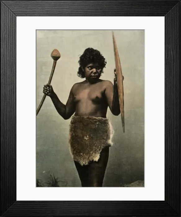 Framed Print : Femme Australienne Chargee Des Armes De Son Mari, (Austrailan Woman with Husbands Weapons), 1900 Framed Print : Femme Australienne Chargee Des Armes De Son Mari, (Austrailan Woman with Husbands Weapons), 1900