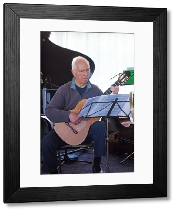 Framed Print : John Williams, Watermill Jazz Club, Dorking, Surrey, UK, 14 May 2019. Creator: Brian O Connor Framed Print : John Williams, Watermill Jazz Club, Dorking, Surrey, UK, 14 May 2019. Creator: Brian O Connor