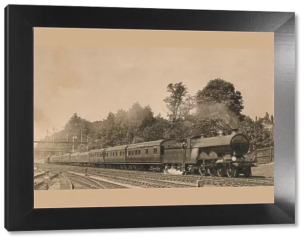 Down Brighton Express near South Croydon. Engine 4-4-2, No. 421, c1920. Creator: Unknown