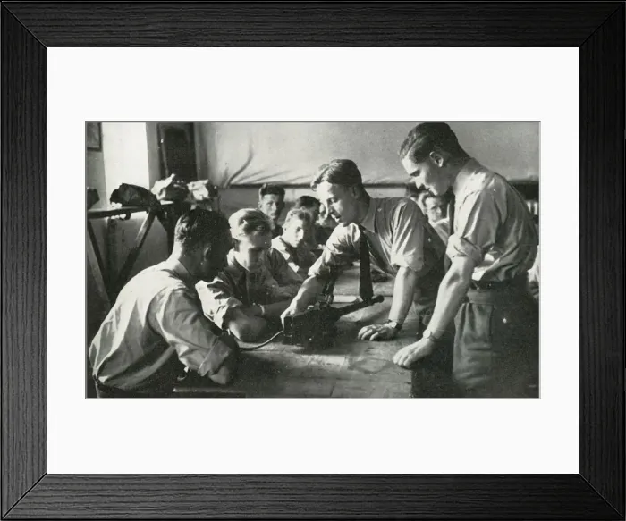 Framed Print : RAF personnel learning about weapons, 1941. Creator: Charles Brown Framed Print : RAF personnel learning about weapons, 1941. Creator: Charles Brown
