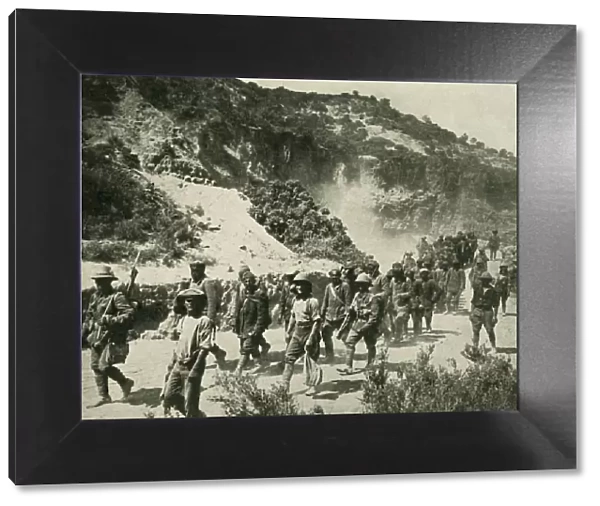 British troops with Turkish prisoners, First World War, 1915, (c1920). Creator: Unknown