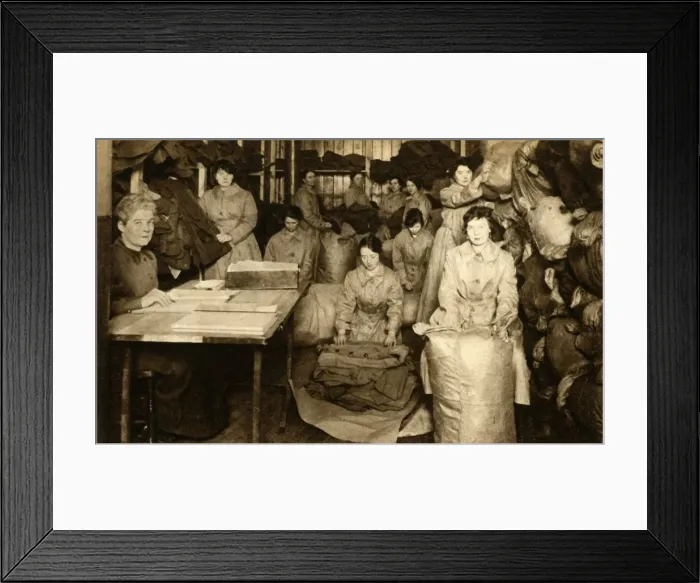 Framed Print : Sorting uniforms at the WaC clothing store, First World War, 1914-1918, (1933). Creator: Unknown Framed Print : Sorting uniforms at the WaC clothing store, First World War, 1914-1918, (1933). Creator: Unknown