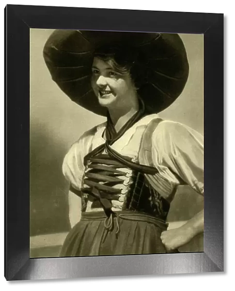 Woman in traditional costume, Tyrol, Austria, c1935. Creator: Unknown