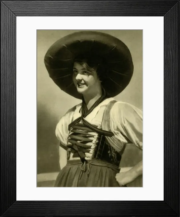 Framed Print : Woman in traditional costume, Tyrol, Austria, c1935. Creator: Unknown Framed Print : Woman in traditional costume, Tyrol, Austria, c1935. Creator: Unknown