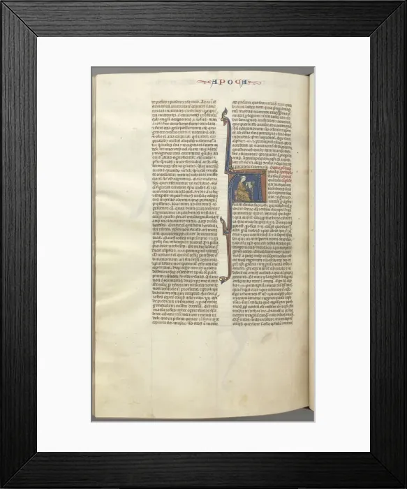 Framed Print : Fol. 482v, Revelations, historiated initial A, John seated at a desk writing... c Framed Print : Fol. 482v, Revelations, historiated initial A, John seated at a desk writing... c