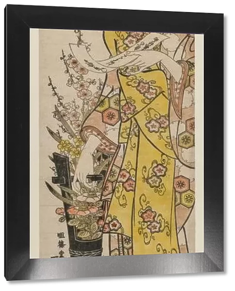 Courtesan Reading a Poem Slip Tied to Flowers in a Vase, mid-1740s. Creator: Ishikawa Toyonobu