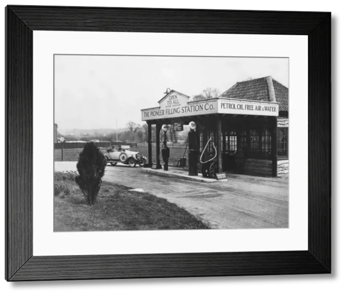 Framed Print : 1923 Calcott 10hp at petrol station. Creator: Unknown Framed Print : 1923 Calcott 10hp at petrol station. Creator: Unknown