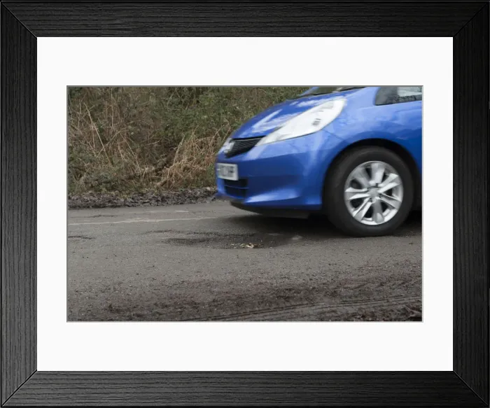 Framed Print : Pot holes in road surface 2017. Creator: Unknown Framed Print : Pot holes in road surface 2017. Creator: Unknown