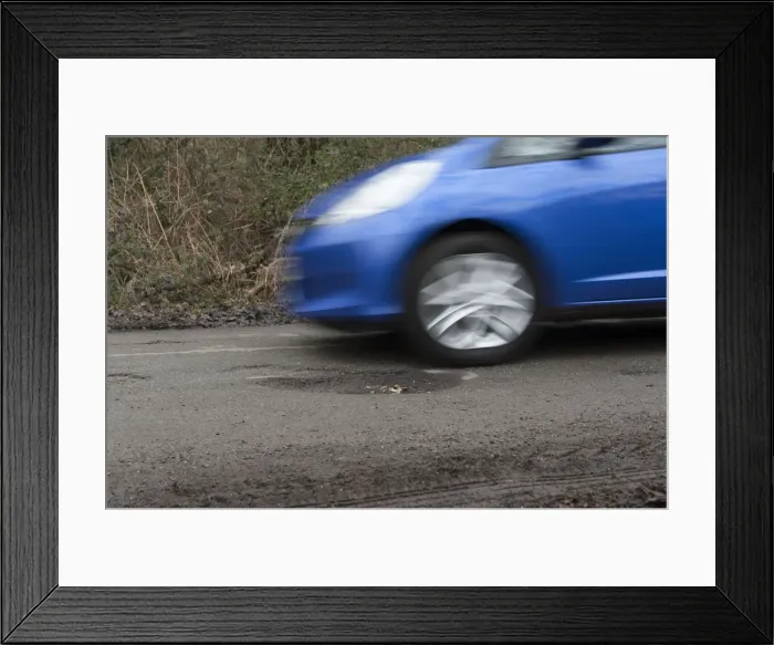 Framed Print : Pot holes in road surface 2017. Creator: Unknown Framed Print : Pot holes in road surface 2017. Creator: Unknown