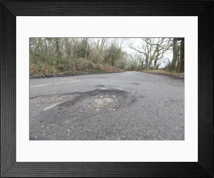 Framed Print : Pot holes in road surface 2017. Creator: Unknown Framed Print : Pot holes in road surface 2017. Creator: Unknown