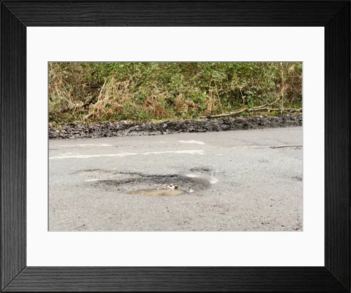 Framed Print : Pot holes in road surface 2017. Creator: Unknown Framed Print : Pot holes in road surface 2017. Creator: Unknown